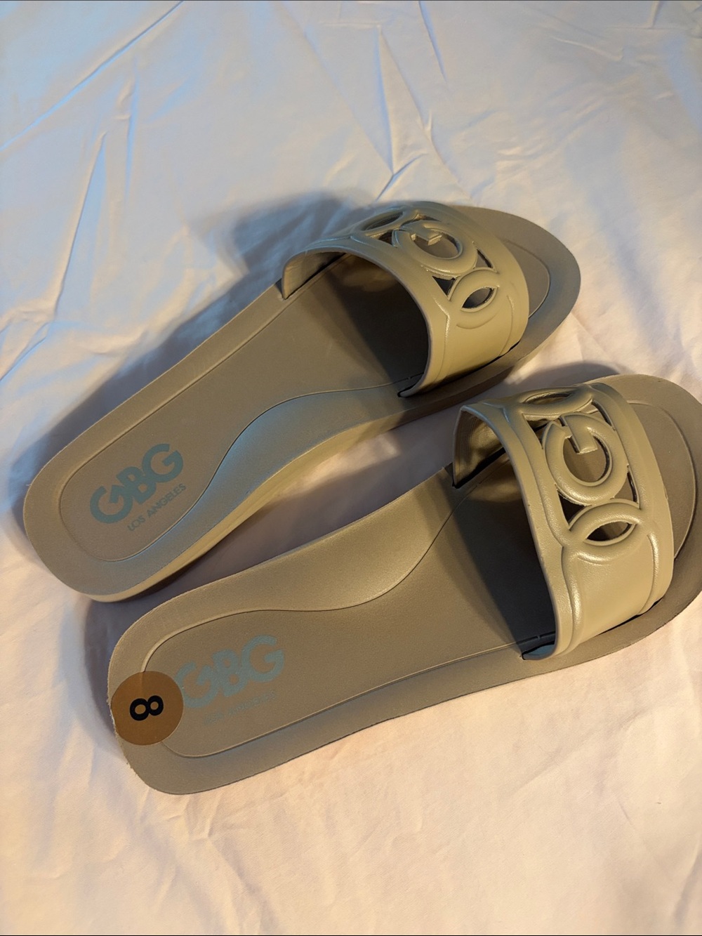 GBG Los Angeles Women's Light Beige Slide Sandals with Cutout Logo Strap